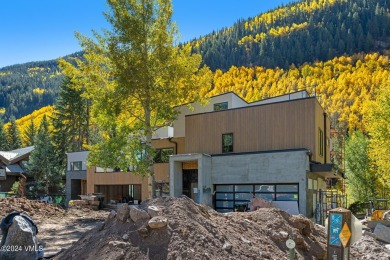 This unparalleled blend of elegance and exclusivity in the heart on Vail Golf Club in Colorado - for sale on GolfHomes.com, golf home, golf lot