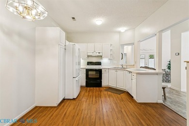 This beautifully maintained end-unit townhome in the desirable on Kiln Creek Golf and Country Club in Virginia - for sale on GolfHomes.com, golf home, golf lot