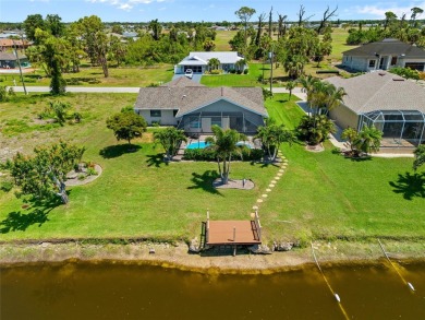 SELLER PRICED TO SELL! CANALFRONT POOL HOME LOCATED IN THE on Rotonda Golf and Country Club The Palms Course in Florida - for sale on GolfHomes.com, golf home, golf lot