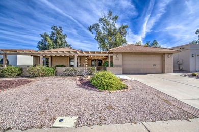 Discover the ultimate active adult living with this furnished on Coyote Run Golf Course in Arizona - for sale on GolfHomes.com, golf home, golf lot