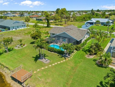 SELLER PRICED TO SELL! CANALFRONT POOL HOME LOCATED IN THE on Rotonda Golf and Country Club The Palms Course in Florida - for sale on GolfHomes.com, golf home, golf lot