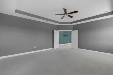 One or more photo(s) were virtually staged. Tucked away at the on Red Tail Golf Club in Florida - for sale on GolfHomes.com, golf home, golf lot