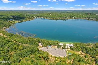 This over-sized corner lot is located in Unit 1 of the peaceful on Sunny Hills Golf and Country Club in Florida - for sale on GolfHomes.com, golf home, golf lot