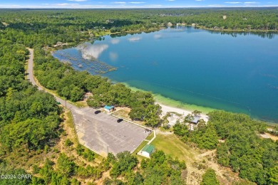 This over-sized corner lot is located in Unit 1 of the peaceful on Sunny Hills Golf and Country Club in Florida - for sale on GolfHomes.com, golf home, golf lot