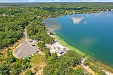 This over-sized corner lot is located in Unit 1 of the peaceful on Sunny Hills Golf and Country Club in Florida - for sale on GolfHomes.com, golf home, golf lot