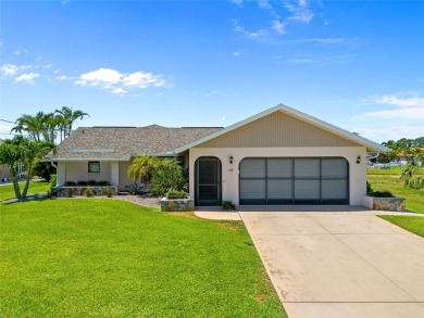SELLER PRICED TO SELL! CANALFRONT POOL HOME LOCATED IN THE on Rotonda Golf and Country Club The Palms Course in Florida - for sale on GolfHomes.com, golf home, golf lot