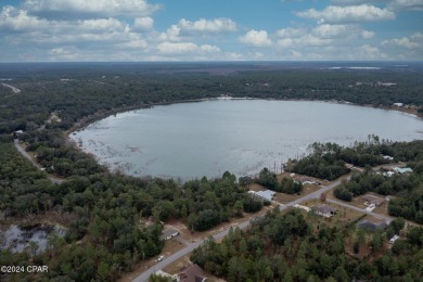 This over-sized corner lot is located in Unit 1 of the peaceful on Sunny Hills Golf and Country Club in Florida - for sale on GolfHomes.com, golf home, golf lot