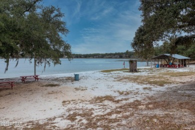 This over-sized corner lot is located in Unit 1 of the peaceful on Sunny Hills Golf and Country Club in Florida - for sale on GolfHomes.com, golf home, golf lot