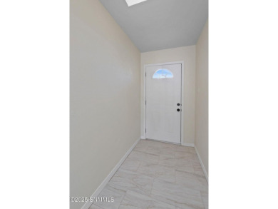 This stunning 3-bedroom, 2-bath home offers 2,417 sqft of living on New Mexico St Univ Golf Course in New Mexico - for sale on GolfHomes.com, golf home, golf lot