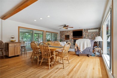 Cozy up to the crackle of the real wood fireplace in this home on Lake McBride Golf Course in Iowa - for sale on GolfHomes.com, golf home, golf lot