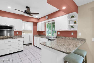 In the heart of Sun City, just steps from the lush Greenbelt and on PalmBrook Country Club in Arizona - for sale on GolfHomes.com, golf home, golf lot