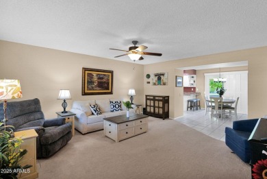 In the heart of Sun City, just steps from the lush Greenbelt and on PalmBrook Country Club in Arizona - for sale on GolfHomes.com, golf home, golf lot