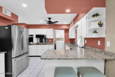 In the heart of Sun City, just steps from the lush Greenbelt and on PalmBrook Country Club in Arizona - for sale on GolfHomes.com, golf home, golf lot