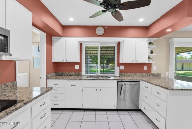In the heart of Sun City, just steps from the lush Greenbelt and on PalmBrook Country Club in Arizona - for sale on GolfHomes.com, golf home, golf lot