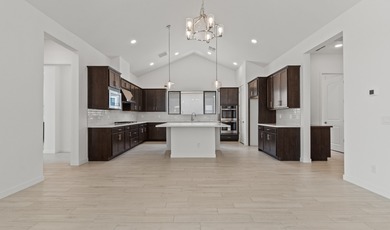 Expansive great room and dining area with optional vaulted on  in Arizona - for sale on GolfHomes.com, golf home, golf lot