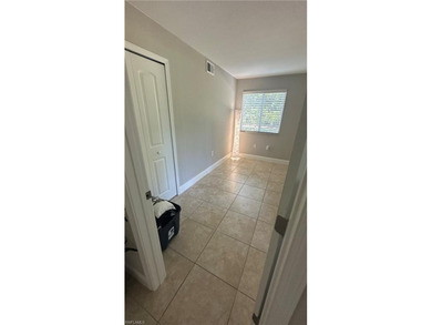 Beautifully Renovated FIRST FLOOR, CORNER UNIT with private on Fountain Lakes Community Golf Course in Florida - for sale on GolfHomes.com, golf home, golf lot
