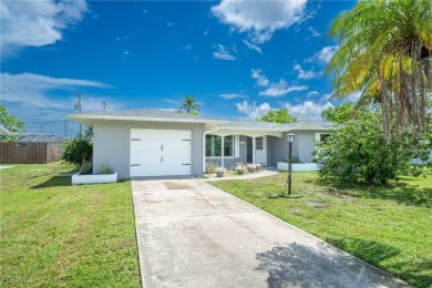 Affordable Pool Home in the Tarpon Point Marina Area of SW Cape on Royal Tee Country Club in Florida - for sale on GolfHomes.com, golf home, golf lot