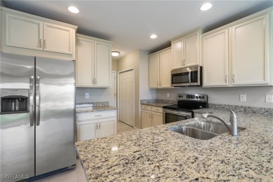 Located in the gated Hammock Cove at Gateway Greens community on Gateway Golf and Country Club in Florida - for sale on GolfHomes.com, golf home, golf lot
