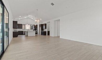 Expansive great room and dining area with optional vaulted on  in Arizona - for sale on GolfHomes.com, golf home, golf lot