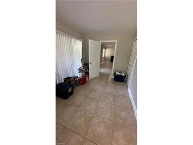 Beautifully Renovated FIRST FLOOR, CORNER UNIT with private on Fountain Lakes Community Golf Course in Florida - for sale on GolfHomes.com, golf home, golf lot