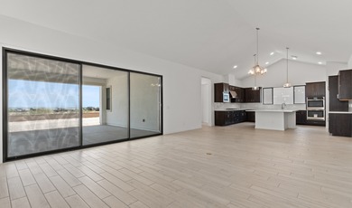 Expansive great room and dining area with optional vaulted on  in Arizona - for sale on GolfHomes.com, golf home, golf lot