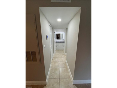 Beautifully Renovated FIRST FLOOR, CORNER UNIT with private on Fountain Lakes Community Golf Course in Florida - for sale on GolfHomes.com, golf home, golf lot