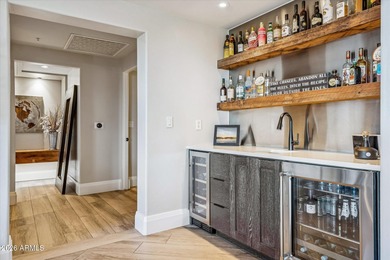 Experience elevated, lock-and-leave living in the heart of on Kierland Golf Club in Arizona - for sale on GolfHomes.com, golf home, golf lot