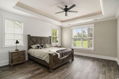 Welcome to this elegant 3-bedroom, 2.5-bath home located in the on Tidewater Golf Club and Plantation in South Carolina - for sale on GolfHomes.com, golf home, golf lot