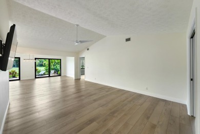 Meticulously Maintained and beautifully updated 3-bedroom on Eagle Wood Golf Course in Florida - for sale on GolfHomes.com, golf home, golf lot