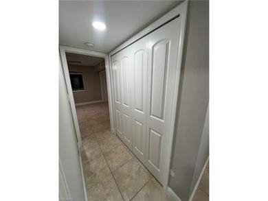 Beautifully Renovated FIRST FLOOR, CORNER UNIT with private on Fountain Lakes Community Golf Course in Florida - for sale on GolfHomes.com, golf home, golf lot