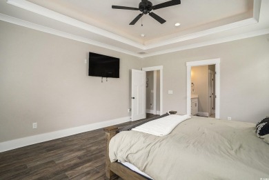 Welcome to this elegant 3-bedroom, 2.5-bath home located in the on Tidewater Golf Club and Plantation in South Carolina - for sale on GolfHomes.com, golf home, golf lot