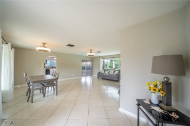 Affordable Pool Home in the Tarpon Point Marina Area of SW Cape on Royal Tee Country Club in Florida - for sale on GolfHomes.com, golf home, golf lot
