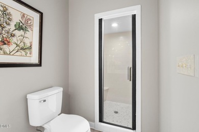 Welcome to this unique and thoughtfully designed home located on on Northgreen Country Club in North Carolina - for sale on GolfHomes.com, golf home, golf lot