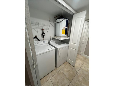 Beautifully Renovated FIRST FLOOR, CORNER UNIT with private on Fountain Lakes Community Golf Course in Florida - for sale on GolfHomes.com, golf home, golf lot