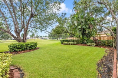 OWNER TO PAY FOR NEW ROOF! FABULOUS HOME IN HIGHLY DESIREABLE on Weston Hills Country Club in Florida - for sale on GolfHomes.com, golf home, golf lot