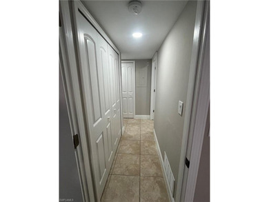 Beautifully Renovated FIRST FLOOR, CORNER UNIT with private on Fountain Lakes Community Golf Course in Florida - for sale on GolfHomes.com, golf home, golf lot