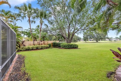 OWNER TO PAY FOR NEW ROOF! FABULOUS HOME IN HIGHLY DESIREABLE on Weston Hills Country Club in Florida - for sale on GolfHomes.com, golf home, golf lot