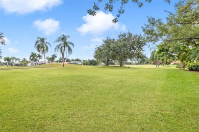 OWNER TO PAY FOR NEW ROOF! FABULOUS HOME IN HIGHLY DESIREABLE on Weston Hills Country Club in Florida - for sale on GolfHomes.com, golf home, golf lot