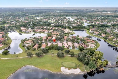 OWNER TO PAY FOR NEW ROOF! FABULOUS HOME IN HIGHLY DESIREABLE on Weston Hills Country Club in Florida - for sale on GolfHomes.com, golf home, golf lot