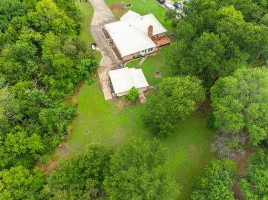 Discover the charm of rural living at 12004 Trailwood Dr in on White Bluff Resort - New Course in Texas - for sale on GolfHomes.com, golf home, golf lot