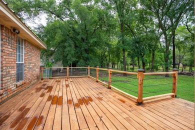 Discover the charm of rural living at 12004 Trailwood Dr in on White Bluff Resort - New Course in Texas - for sale on GolfHomes.com, golf home, golf lot