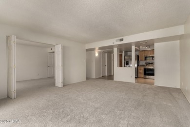 Welcome to resort-style living in this stunning first-floor on Scottsdale Shadows in Arizona - for sale on GolfHomes.com, golf home, golf lot