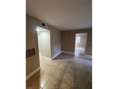 Beautifully Renovated FIRST FLOOR, CORNER UNIT with private on Fountain Lakes Community Golf Course in Florida - for sale on GolfHomes.com, golf home, golf lot