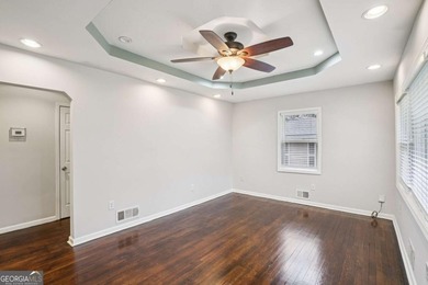 Charming brick ranch on a basement, perfectly positioned in a on Browns Mill Golf Course in Georgia - for sale on GolfHomes.com, golf home, golf lot