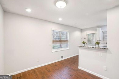 Charming brick ranch on a basement, perfectly positioned in a on Browns Mill Golf Course in Georgia - for sale on GolfHomes.com, golf home, golf lot