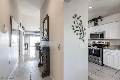Welcome to your dream second-floor condo with breathtaking views on Heritage Palms Golf and Country Club in Florida - for sale on GolfHomes.com, golf home, golf lot