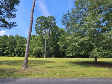 Beautiful .50-acre level building lot with a Boat Slip in Wyboo on Players Course At Wyboo Plantation in South Carolina - for sale on GolfHomes.com, golf home, golf lot