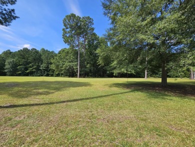 Beautiful .50-acre level building lot with a Boat Slip in Wyboo on Players Course At Wyboo Plantation in South Carolina - for sale on GolfHomes.com, golf home, golf lot
