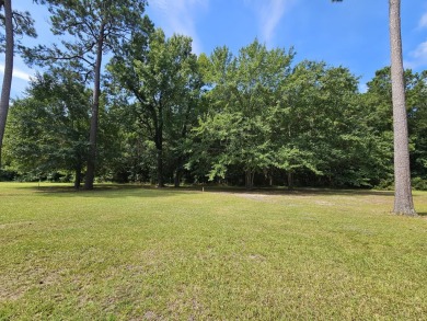Beautiful .50-acre level building lot with a Boat Slip in Wyboo on Players Course At Wyboo Plantation in South Carolina - for sale on GolfHomes.com, golf home, golf lot