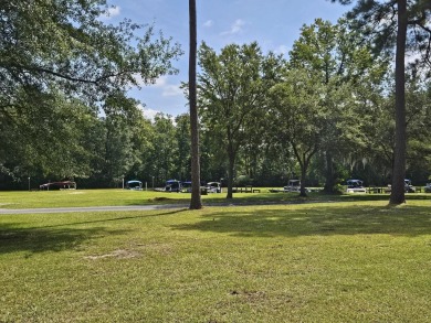 Beautiful .50-acre level building lot with a Boat Slip in Wyboo on Players Course At Wyboo Plantation in South Carolina - for sale on GolfHomes.com, golf home, golf lot